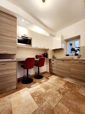 Fridge, microwave, coffee/tea maker, toaster