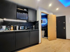 Fridge, microwave, coffee/tea maker, toaster