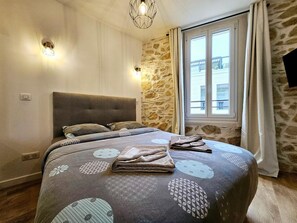 1 chambre, fer et planche à repasser, Wi-Fi gratuit, draps fournis