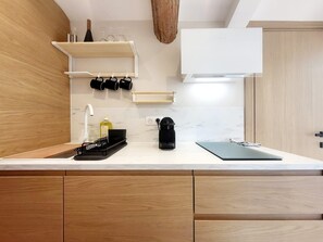 Fridge, microwave, coffee/tea maker, toaster