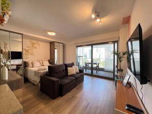 1 bedroom, desk, iron/ironing board, travel crib