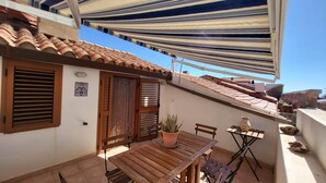 Outdoor dining - Giuliana and Nino's Nest. (Carloforte)