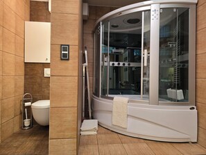 Jetted bath, hair dryer, towels, soap