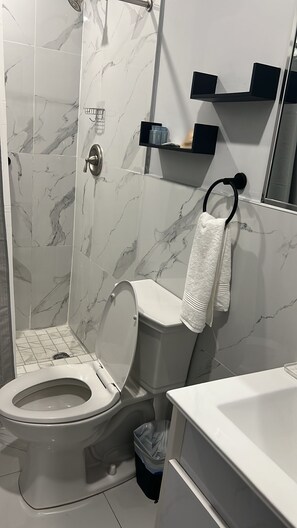 Shower, hair dryer, towels, soap - Bella Signature Suites  (Nassau)
