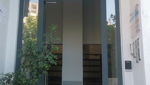 A building entrance with a sign reading "Palleti nr. 1101". - Central/2 Bedrooms/KingBed/Balcony/FullKitchen (Durazzo)