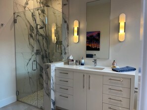 Shower, jetted tub, hair dryer, bidet