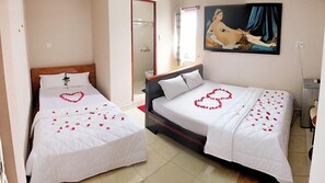 Standard Triple Room, City View | Desk, blackout curtains, soundproofing, free WiFi - Ban Mai Hotel 66 (Phan Thiet)
