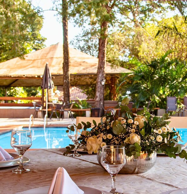 Outdoor pool, pool umbrellas, sun loungers