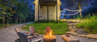 Peaceful 2BR Forest Cabin Near Ark W/Fire Pit, Deck & Vaulted Ceilings