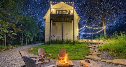 Peaceful 2BR Forest Cabin Near Ark W/Fire Pit, Deck & Vaulted Ceilings