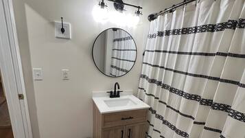 Hair dryer, towels, soap, toilet paper