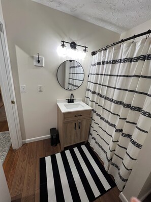 Hair dryer, towels, soap, toilet paper