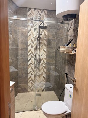 Hair dryer, towels, soap, toilet paper