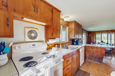 Peaceful coastal cabin with screened porch views of the cove, meadow, and sea
