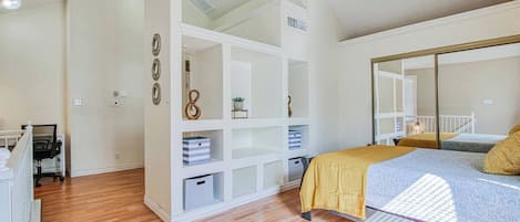 1 bedroom, desk, iron/ironing board, travel crib