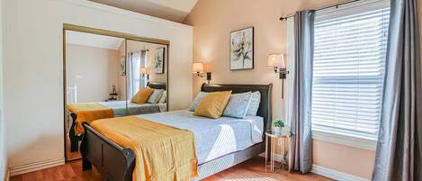 1 bedroom, desk, iron/ironing board, travel crib