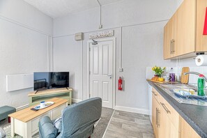 Fridge, microwave, toaster, cookware/dishes/utensils