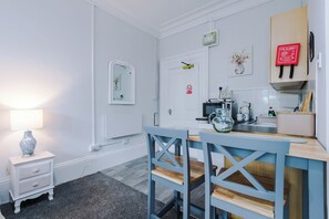 Fridge, microwave, toaster, cookware/dishes/utensils