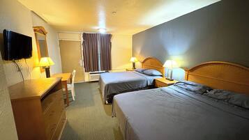 Room, 2 Queen Beds, Smoking | In-room safe, iron/ironing board, free WiFi, bed sheets