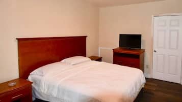 Room, 2 Queen Beds, Smoking | In-room safe, iron/ironing board, free WiFi, bed sheets