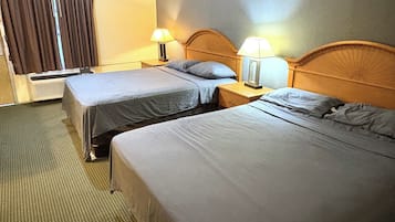Room, 2 Queen Beds, Smoking | In-room safe, iron/ironing board, free WiFi, bed sheets