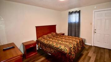 Room, 1 Queen Bed, Smoking | In-room safe, iron/ironing board, free WiFi, bed sheets
