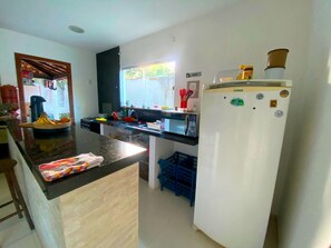 Fridge, microwave, oven, cookware/dishes/utensils
