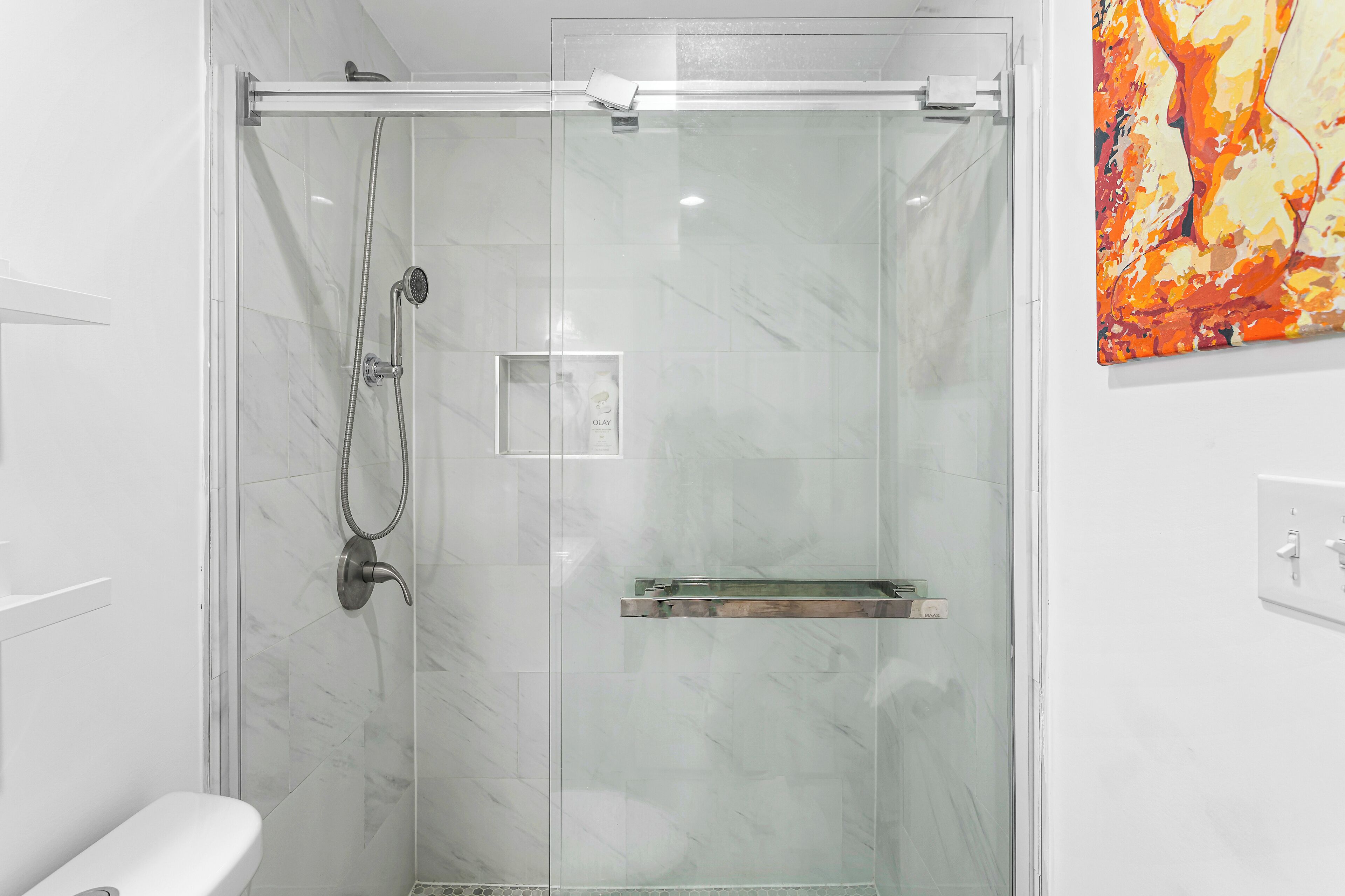 Shower, towels, soap, toilet paper