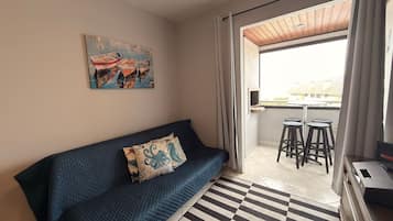 Huoneisto | Oleskelualue | Taulutelevisio, Netflix, maksullisia elokuvia, suoratoistopalvelut