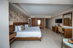 Premium bedding, down comforters, minibar, in-room safe