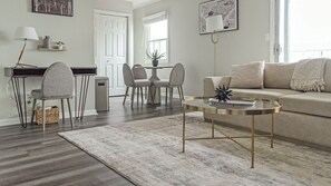 Apartment, 2 Bedrooms | Living area | 50-inch TV with digital channels