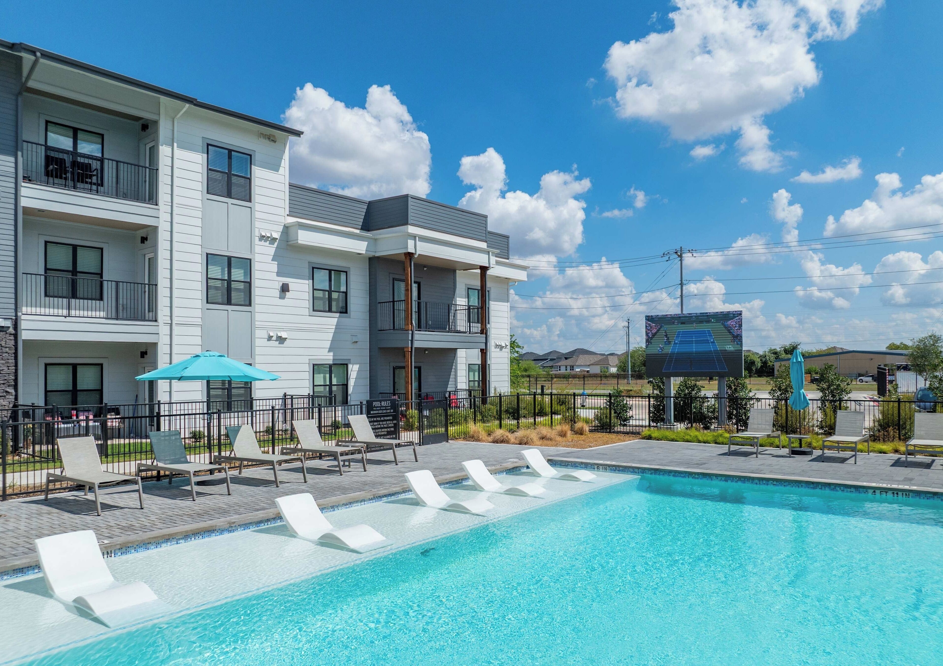 Seasonal outdoor pool, pool loungers