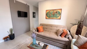 Studio | Living area | TV - Manhattan Flats (Itapema)
