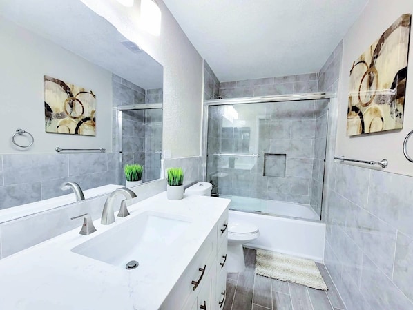 Hair dryer, towels, soap, toilet paper