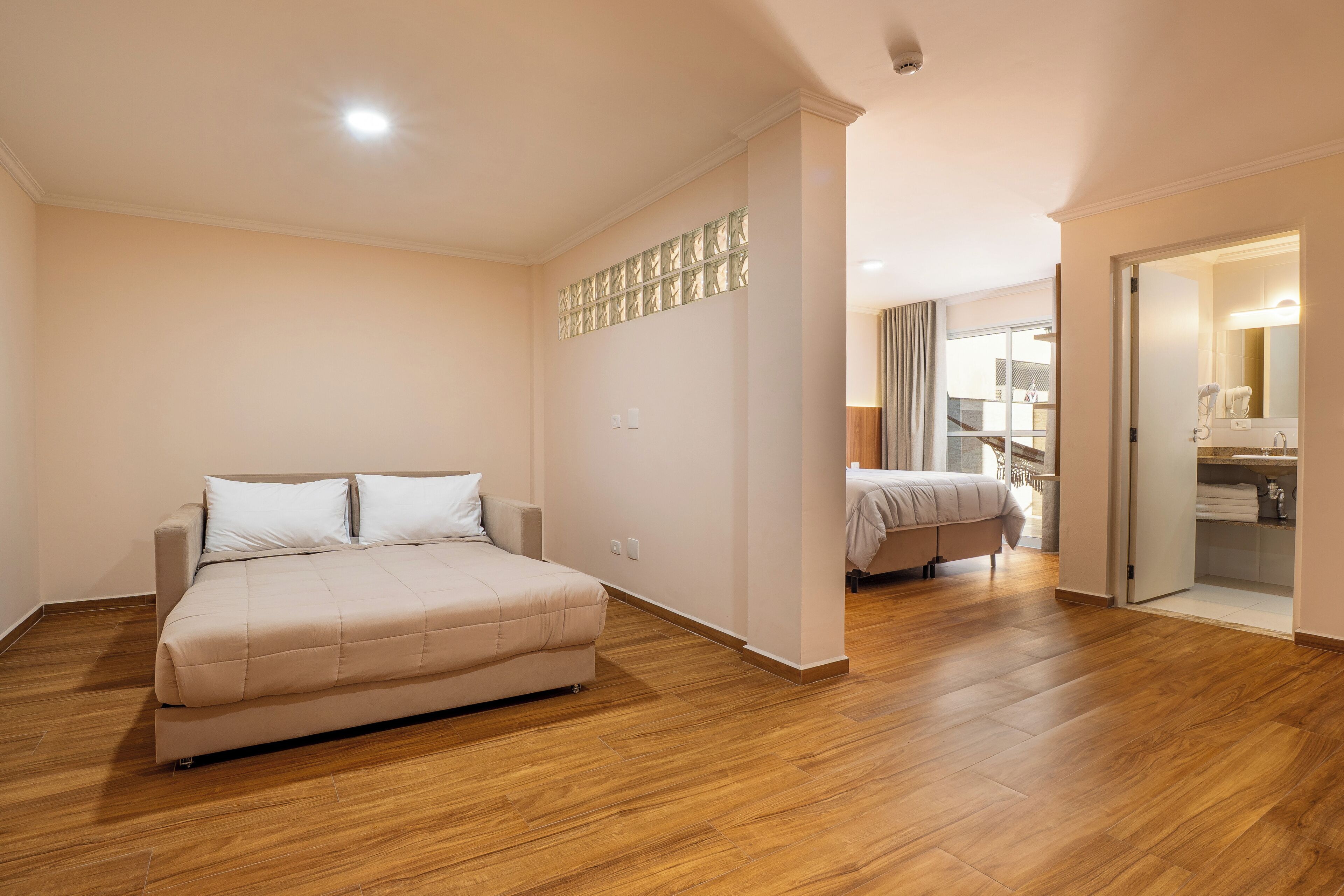Exclusive Quadruple Room, City View | Desk, laptop workspace, free WiFi