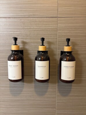 Shower, hair dryer, towels, soap