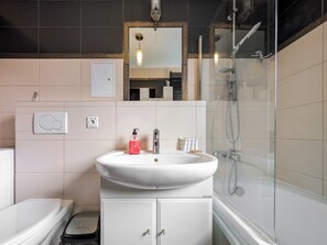 Hair dryer, towels, soap, shampoo