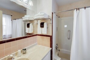 Shower, jetted tub, hair dryer, towels