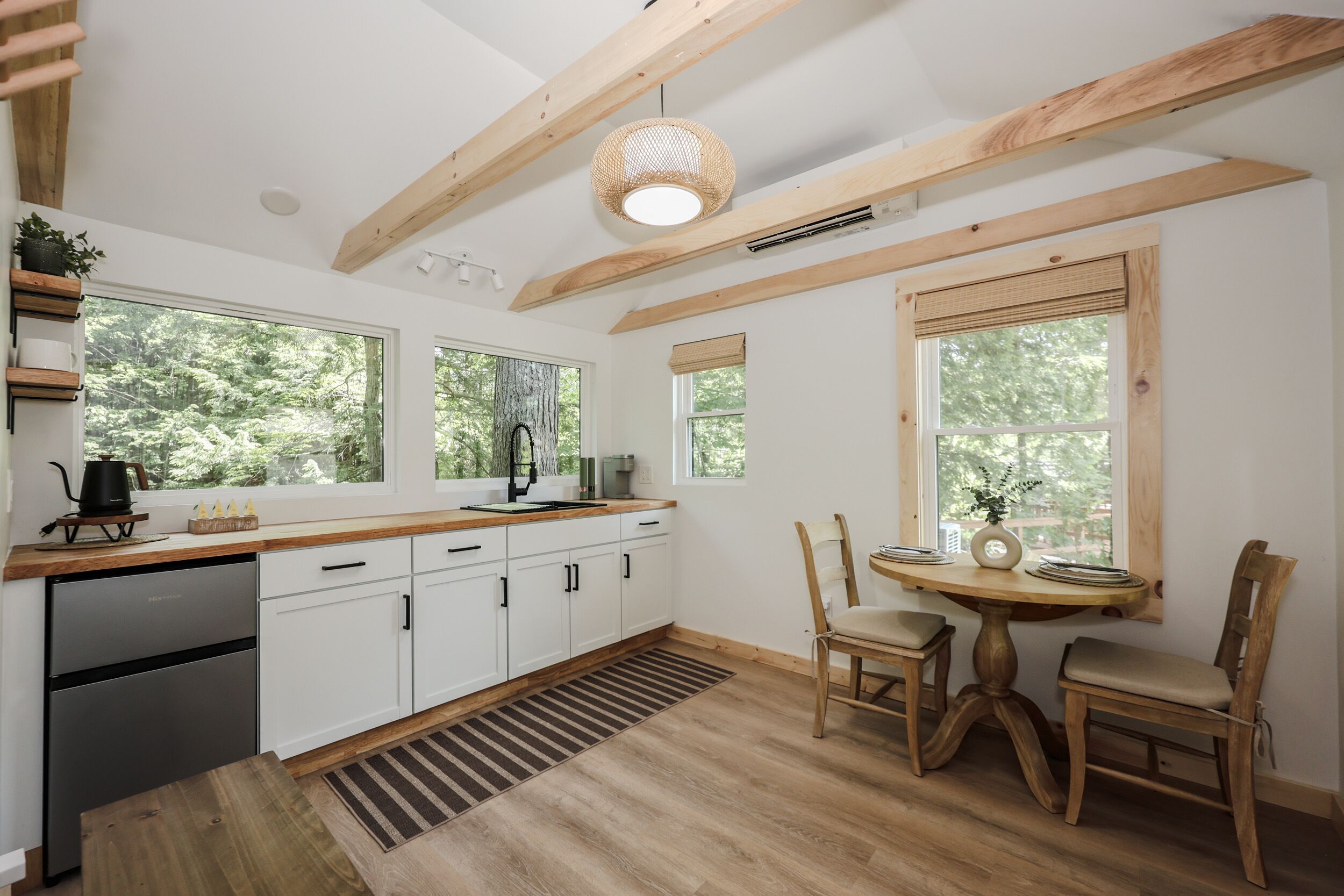 Fridge, microwave, coffee/tea maker, cookware/dishes/utensils