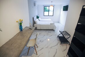 Chambre quadruple exécutive | Accès au Wi-Fi (inclus), literie fournie