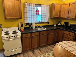 Fridge, microwave, oven, stovetop - The Little Red Barn (Cedar Falls)