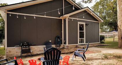 New! Pecan Hide Out is a rustic home with fire pit and tree house!