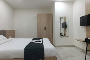 Habitación Deluxe | Escritorio, wifi gratis y ropa de cama 