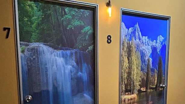 Two doors with numbers 7 and 8, each displaying a different scenic image: a waterfall and a mountainous landscape. - Vintage Inn Jonker Walk Melaka (Malacca City)