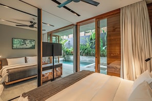 Appartement Deluxe, 1 chambre, patio, vue piscine | Coffres-forts dans les chambres, Wi-Fi gratuit, draps fournis
