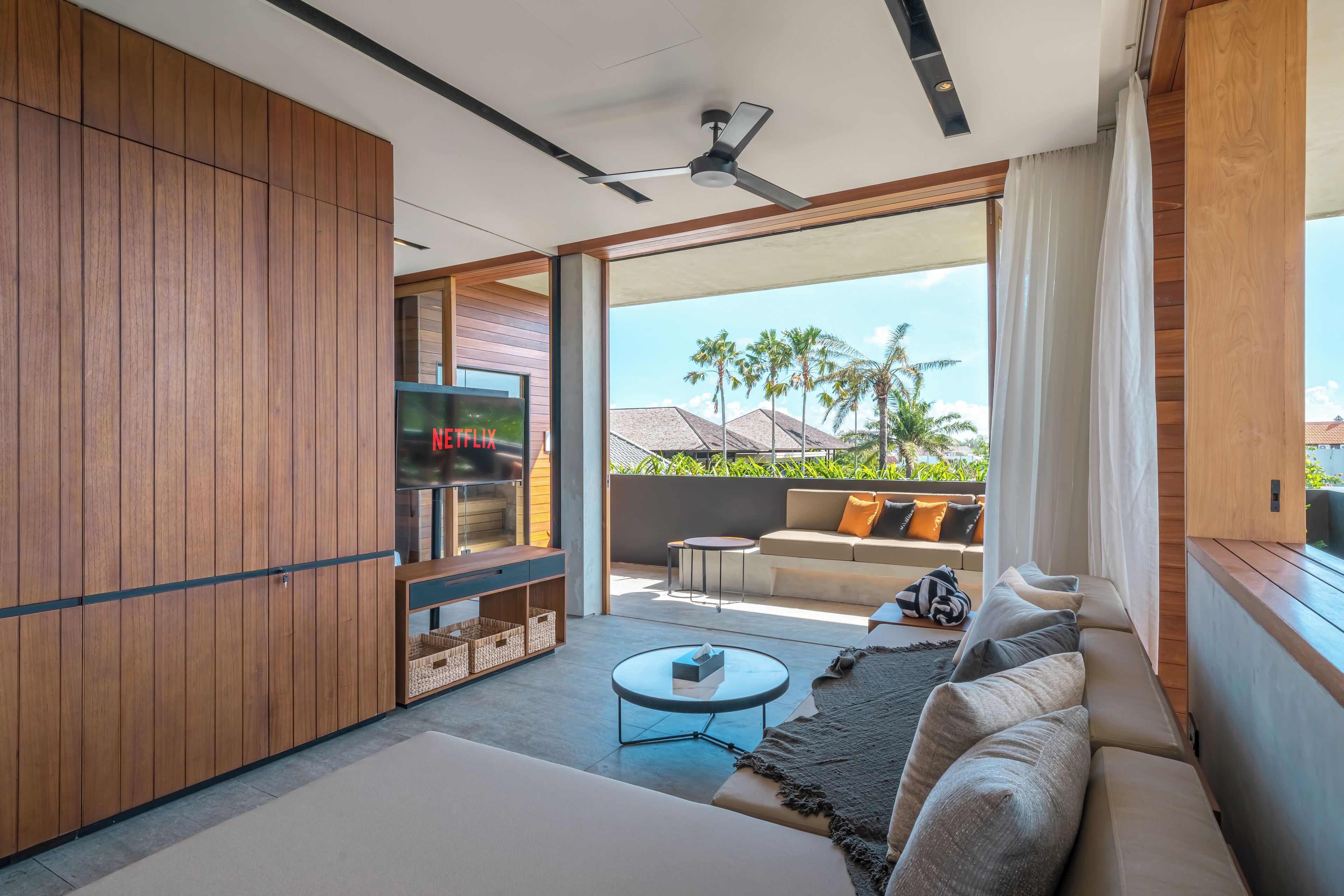 One-Bedroom Apartment - Corner Terrace with Sauna & Ice Bath | Living area | Flat-screen TV