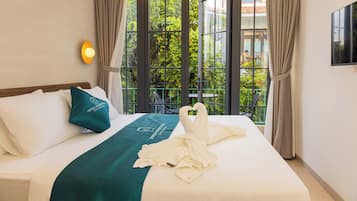 Deluxe Suite, City View | In-room safe, blackout drapes, iron/ironing board, free WiFi