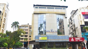 A hotel with a modern facade, large windows, and a sign for 'Hotel Atlantic'. - Hotel Atlantic (Mumbai)