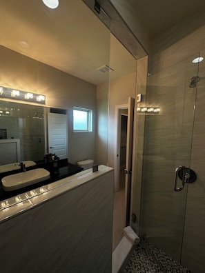 Shower, hair dryer, towels, soap