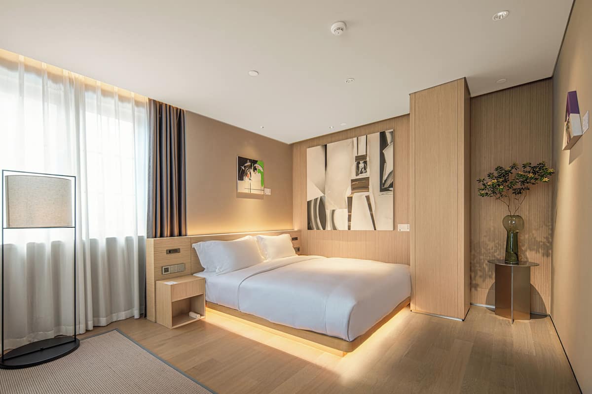 Senior Suite, 1 Queen Bed, Non Smoking, City View | Laptop workspace, blackout curtains, free WiFi